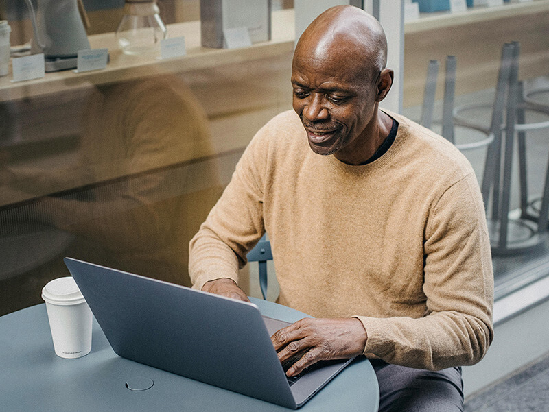 An image of James using MeetApp on his computer.&lrm;